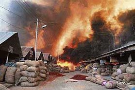 A major fire erupted at Asias largest red chilli market in Andhra Pradeshs Guntur town on Saturday. The fire engulfed the entire market yard, destroying 450 shops.