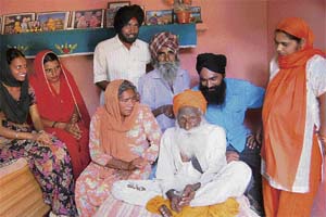 Bachan Singh with family members at his native village