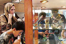 Visitors at a Mobile phone Fair in Dhaka on Sunday. The two-day fair is an indicator that mobile telephones are no more a luxury in impoverished Bangladesh, where they have become a part of daily life. 