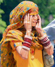 A newly wed braves the heat with a smile.