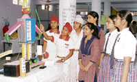 Students look at a science model during an exhibition at Guru Nanak Public School in Ludhiana on Sunday.