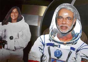 Gujarat Chief Minister Narendra Modi framed in the mask of an astronaut after the inauguration of Hall of Space and Hall of Science in Ahmedabad