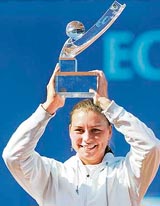 Russia's Vera Zvonareva holds the trophy as she celebrates after winning the final match against Victoria Azarenka of Belarus at the Prague Open 2008 tennis tournament in Prague on Sunday.