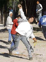 Bolivians opposed to the referendum on autonomy that the Santa Cruz provincial government and civic groups are holding, confront those who are in favour, in Santa Cruz on Sunday. 