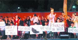 Schoolchildren enact a ballet to highlight the importance of rainwater harvesting in the Capital