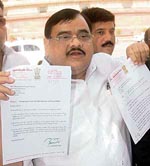 Dr Akhilesh Das, Congress MP from Rajya Sabha, talks to mediapersons after submitting his resignation at Parliament house in New Delhi on Tuesday.