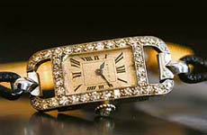 A very fine enamel and diamond cocktail watch made by Cartier in 1924 is pictured during a preview at Sotheby's auction house in Geneva on Wednesday. The watch is expected to fetch between  $ 6,000 and $ 10,000 during an auction sale in Geneva on May 15