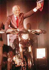 Ducati CEO Gabriele Del Torchio poses with newly launched motorcycle in New Delhi on Wednesday.