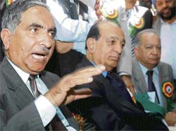 Ghulam Hassan Mir addresses a press conference at the launch of the Jammu and Kashmir Democratic Party in Srinagar on Wednesday.