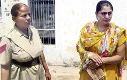 Harvinder Kaur, one of the accused, comes out of a court in Malerkotla