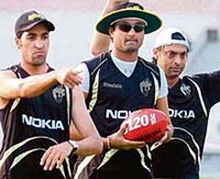 Kolkata Knight Riders' pacer Shoaib Akhtar (R), Ranadeb Bose and Umar Gul (L) during a practice session at Eden Gardens in Kolkata.