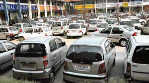 Vehicles parked in a haphazard manner in Sector 9, Chandigarh, on Thursday. 