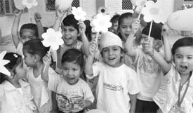 Tiny tots celebrate yellow day in Shivalik Public School in Mohali. 
