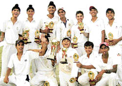 APJ Kharar team in joyous after winning the APJ U-16 Mohali Cricket Tournament in Mohali on Thursday.