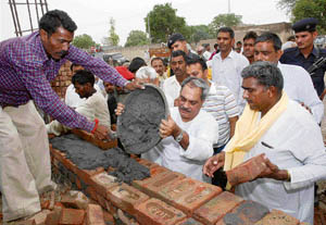 Congress MLA from Ambala Venod Sharma takes part in kar sewa for the construction of a temple in a Balmiki locality on the occasion of Bhagwan Parshuram Jayanti in Saalwan village in Karnal district on Thursday. 