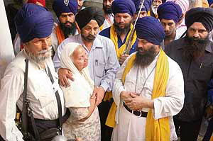 Family members of Budha Dal chief Baba Santa Singh at Rajindra hospital, Patiala, on Thursday.