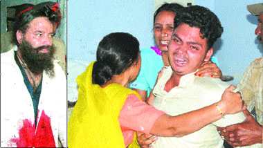 Ranjit Singh; and (right): Son of Surinder, who was murdered in a park, being consoled by relatives at civil hospital in Jalandhar on Thursday.