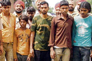 Yarn thieves in police custody.