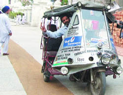 BV Narayana in his specially-modified motorbike in Amritsar on Friday.