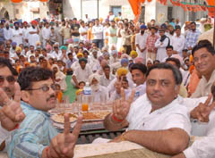 Local bodies minister Manoranjan Kalia along with Kamal Sharma and Dayal Sodhi, candidate for Bhucho Kalan, at a rally on Friday. 