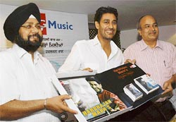 Punjabi singer and actor Harbhajan Mann with his team at the release function of his 