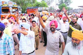 Staff on poll duty raise slogans against the administrations apathetic attitude in Rajpura