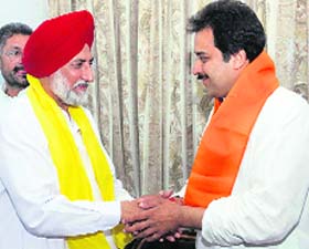 President of the Haryana Janhit Congress (BL) Kuldeep Bishnoi welcomes rebel HPCC secretary Dharam Pal Singh Dachar into the party fold in Karnal