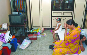 The ransacked house of Shambu Dayal Sharma where robbers looted cash and jewellery worth Rs 40 lakh at Raghu Nagar, Pankha Road in the Capital on Monday. 