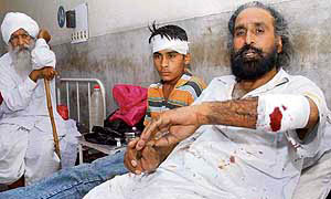 An injured Baljinder Singh Mann of Ghagga village, lying in the Civil Hospital,Gidderbaha, in Muktsar district on Monday.
