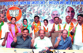 Delhi BJP president Harsh Vardhan, senior party leader V.K. Malhotra and the eight candidates