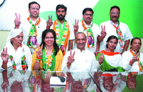DPCC president J.P. Aggarwal along with the eight candidates