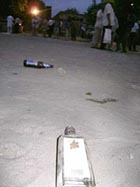 Empty liquor bottles lying at Government Senior Secondary School, Dehlon, a collection centre for ballot boxes.