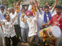 Supporters of Ravinder Singh (Congress candidate from block Majri) after his win in the block samiti elections in Mohali on Wednesday