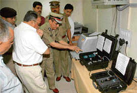 UT administrator Gen S.F. Rodrigues (retd) examines the infrastructure at the new cyber crime cell in Sector 11, Chandigarh, on Wednesday. 