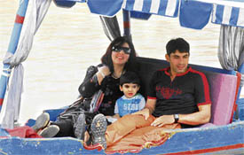 Pakistan player Misbah-ul-Haq and his family enjoy a shikara ride in Sukhna Lake,