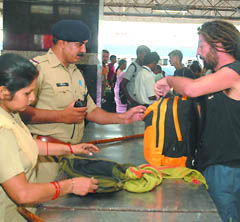 Security personnel check the bag of a passenger at New Delhi Railway Station in the Capital on Wednesday.