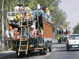 With the authorities failing to take notice of such improvised double-decker trucks, the vehicles continue to pose a danger to those on board.