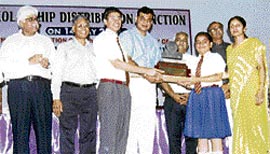 SP City gives a prize to a winner of a declamation contest