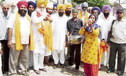 SAD leaders and activists pose with winners of block samiti elections. Also a candidate and his supporters in a jubilant mood at Khera village near Ahmedgarh