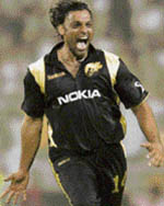 Kolkata Knight Riders Shoaib Akhtar reacts after taking the wicket of Delhi Daredevils Gautam Gambhir during the IPL T20 match at Eden Gardens in Kolkata on Tuesday. 