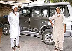 Pritam Singh and Tej Kaur with their new possession, a Pajero.