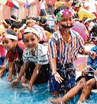 Tiny tots of AKSIPS-45 enjoy a beach party on their school premises in Chandigarh on Friday. A Tribune photograph