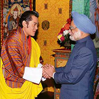Prime Minister Manmohan Singh with Bhutan King Jigme Keshar Namgyal Wangchuck during a meeting in Thimphu on Friday.