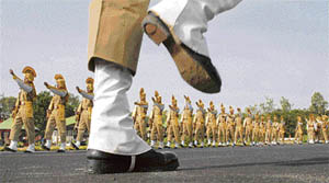 Constables march during the passing out parade of the 16th batch of constables from the Central Industrial Security Force on the outskirts of Hyderabad on Friday.