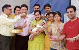 Sachin Kapoor (second from left) shares happy moments with his family