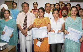 Prof R.C. Sobti with the students who were honoured during the PU alumni meet and scholarship award function in Chandigarh