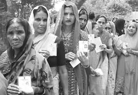 Voters await their turn to cast their votes during the Cantonment Board elections in Ambala