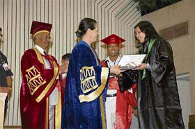 Kanchan Garg receives the gold medal and the degree from UPA chairperson Sonia Gandhi in New Delhi