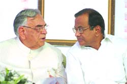 Union finance minister P Chidambaram having a word with MP Governor Balram Jakhar in Jalandhar on Sunday. 