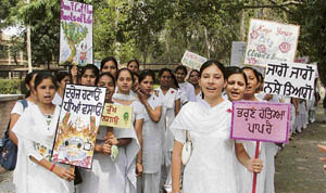 NSS volunteers of the GCW hold a rally in Ludhiana on Sunday. 